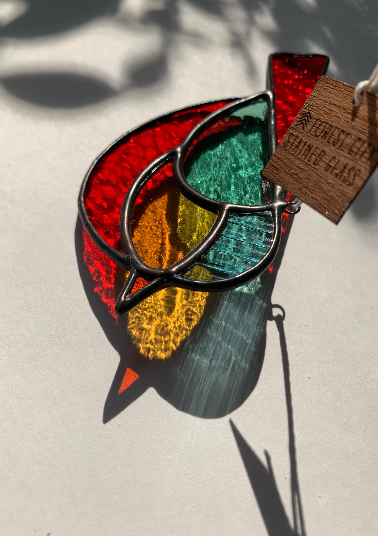 Colorful Bird Friend • Red, Teal, Yellow, Steel