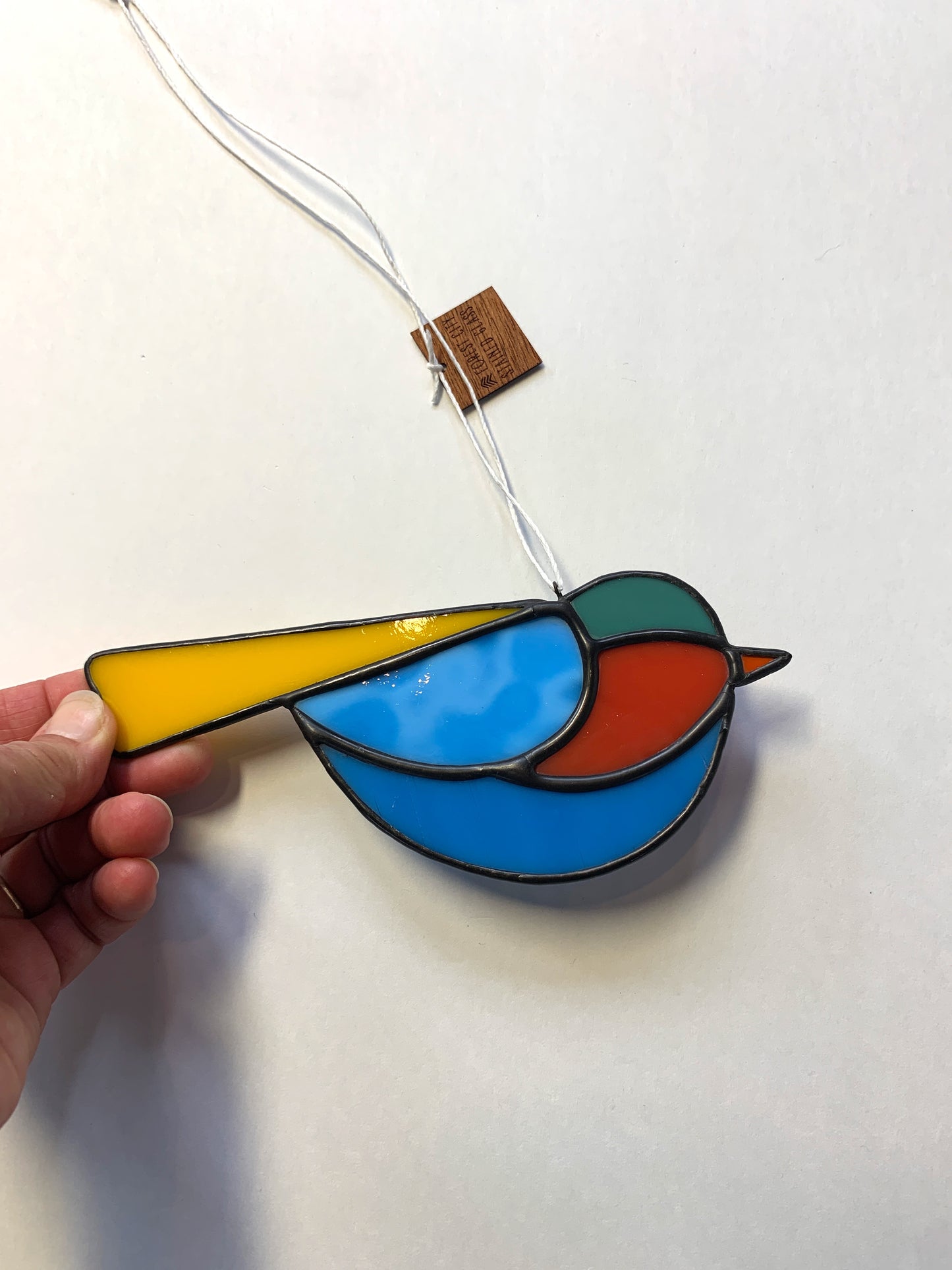 Colorful Bird Friend • Blue, Yellow, Burnt Orange, Teal