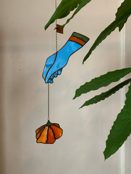 Hand With Orange Flower